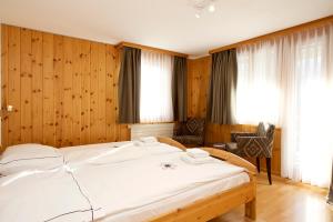 Postel nebo postele na pokoji v ubytování Chalet Felderhof
