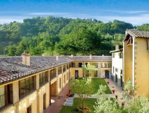 a view of the courtyard of a building at House Roberto by Holiday World in Castel del Piano