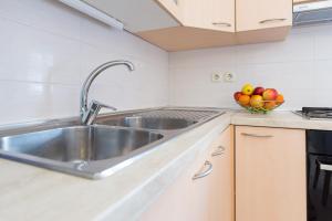 Kuchyň nebo kuchyňský kout v ubytování Apartman Ivona