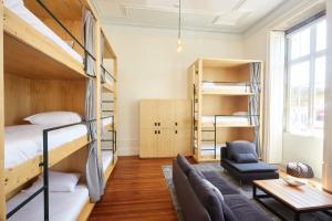 Un ou plusieurs lits dans un hébergement de l'établissement The Passenger Hostel