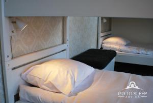 Letto o letti in una camera di Go to sleep Arvika