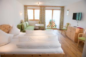 Postel nebo postele na pokoji v ubytování Hotel Hertehof