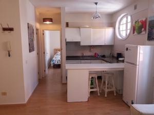 Kuchnia lub aneks kuchenny w obiekcie Apartamento Ossuna