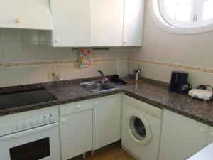 Kuchnia lub aneks kuchenny w obiekcie Apartamento Ossuna