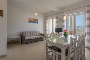 Uma TV ou centro de entretenimento em Stara Kuća Apartments