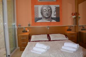 Кровать или кровати в номере Apartamento Roca Bajondillo