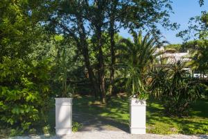 A garden outside Hotel La Bussola