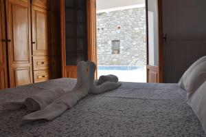 Postel nebo postele na pokoji v ubytování Villa Leonidas just enjoy your holidays