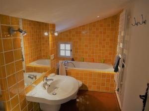 Ванна кімната в Le Mas des Oliviers
