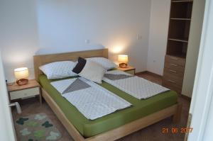 Posteľ alebo postele v izbe v ubytovaní Apartments Armando