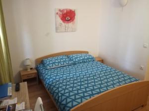 Postel nebo postele na pokoji v ubytování Guest House Kvartin