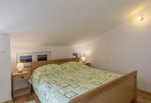 Cama ou camas em um quarto em Stara Kuća Apartments
