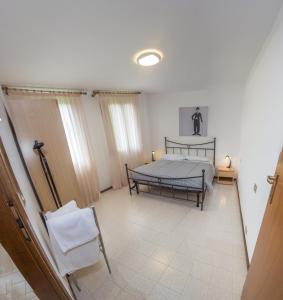 Albergo Diffuso Balcone sul Friuliにあるベッド