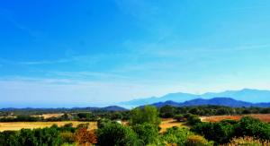 a view of a valley with mountains in the background at La Canardiere in Casta