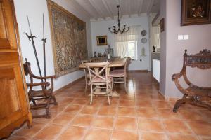 a dining room with a table and chairs at Les Jarrieres in Dame-Marie-les-Bois