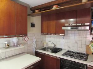 Kuchyň nebo kuchyňský kout v ubytování Apartma Narnia