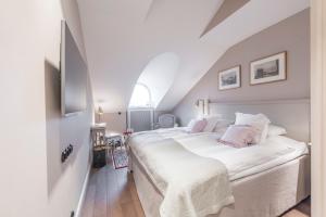 Llit o llits en una habitació de Hotel Kungsträdgården