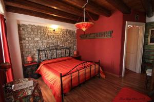 Voodi või voodid majutusasutuse Albergo Julienne toas