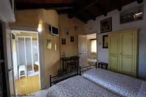 Voodi või voodid majutusasutuse Albergo Julienne toas