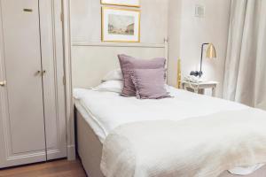 Llit o llits en una habitació de Hotel Kungsträdgården