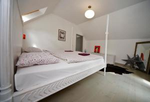 Posteľ alebo postele v izbe v ubytovaní SárgaRigó Holiday Home