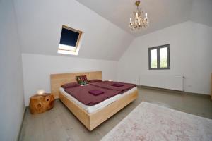 Posteľ alebo postele v izbe v ubytovaní SárgaRigó Holiday Home