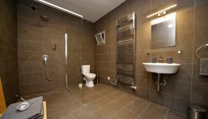 Kúpeľňa v ubytovaní SárgaRigó Holiday Home