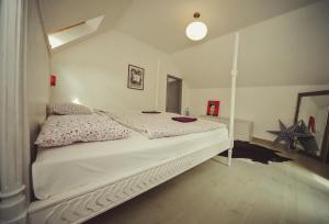 Posteľ alebo postele v izbe v ubytovaní SárgaRigó Holiday Home