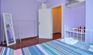Een bed of bedden in een kamer bij Apartmani Nika Tivat