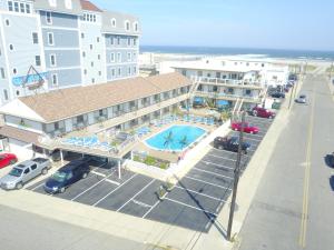 an aerial view of a hotel with a pool and parking lot at Pyramid Resort Motel in Wildwood Crest