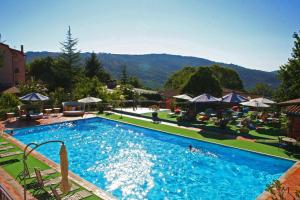 Bazén v ubytování Hotel Sa Muvara nebo v jeho okolí