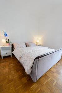 Postel nebo postele na pokoji v ubytování APARTMENT ANA 4+2