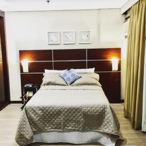 Cama ou camas em um quarto em Nips 502 - Flat Executivo Zona Sul SP
