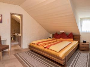 a bedroom with a large bed in a attic at Südtiroler Stube in Seefeld in Tirol