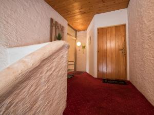 A bed or beds in a room at Südtiroler Stube