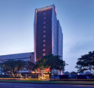 a tall building with lights on top of it at Ibis Gading Serpong in Serpong