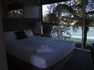 Postel nebo postele na pokoji v ubytování Motel Traralgon