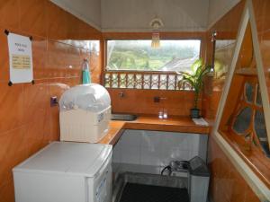 Η κουζίνα ή μικρή κουζίνα στο Dau Homestay