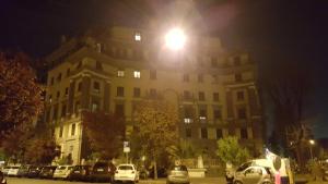 a street light in front of a building at night at Affittacamere Mazzini in Rome