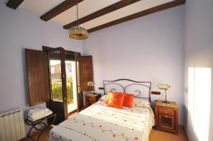 Postel nebo postele na pokoji v ubytování Apartamentos El Canonigo de Teruel