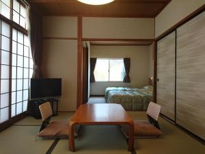 TV o dispositivi per l'intrattenimento presso Onsen Guest House Aobato no Su
