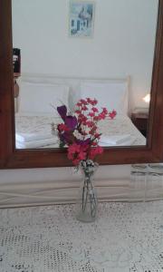 Ліжко або ліжка в номері Artemis Rooms