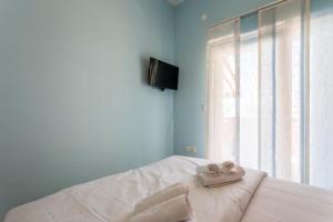 Postel nebo postele na pokoji v ubytování Apartmani Lukić