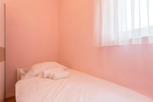 Postel nebo postele na pokoji v ubytování Apartmani Lukić