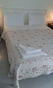 Ліжко або ліжка в номері Artemis Rooms
