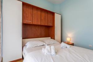 Postel nebo postele na pokoji v ubytování Apartmani Lukić