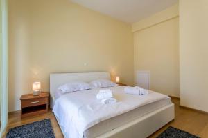 Postel nebo postele na pokoji v ubytování Apartmani Lukić