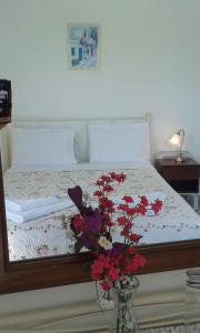 Ліжко або ліжка в номері Artemis Rooms