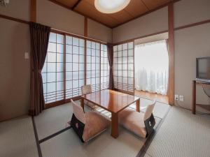 Ruang duduk di Onsen Guest House Aobato no Su