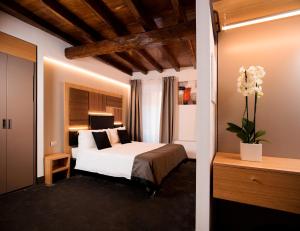 Postel nebo postele na pokoji v ubytování Hotel Trevi - Gruppo Trevi Hotels